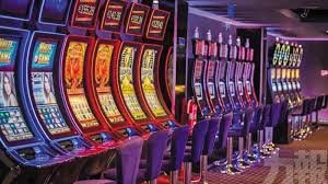 Layar permainan Boom City di kartubet 88 menampilkan grid slot dan kota yang sedang dibangun